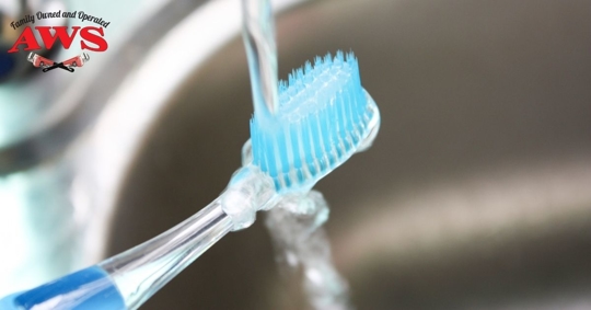 toothbrush under water